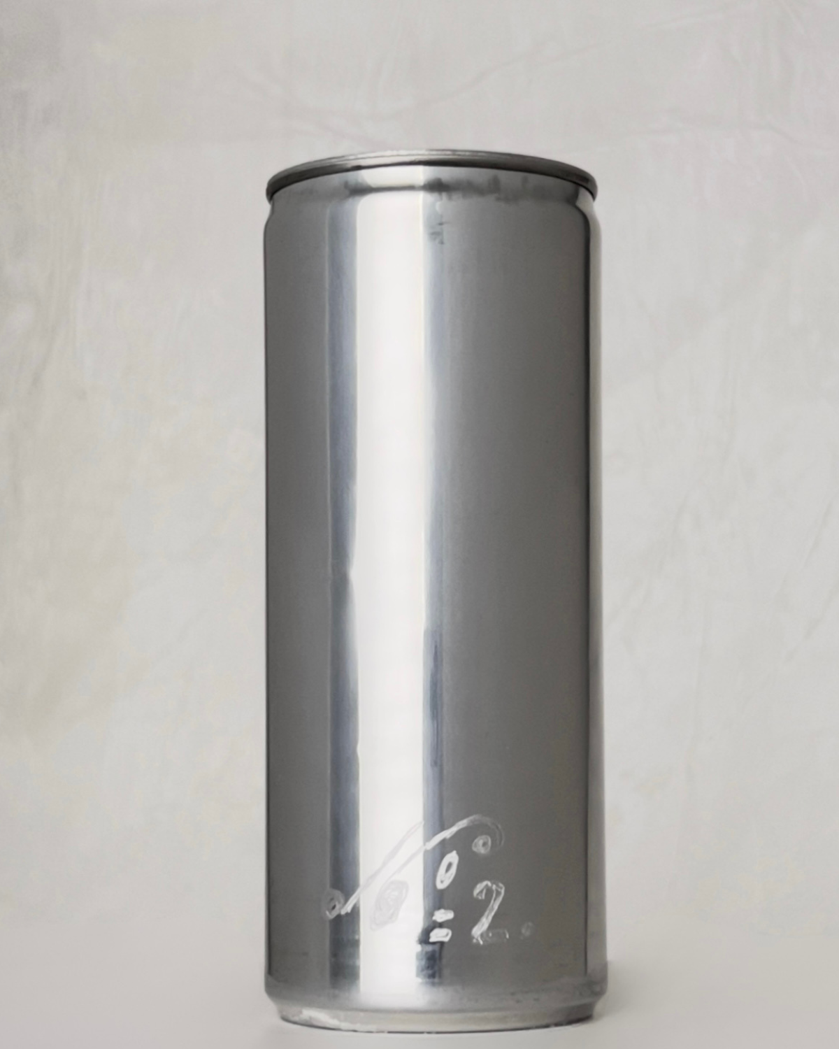 Back of the Sloan Rose N°2 Ember & Cream candle, engraved with the scent number and illustration