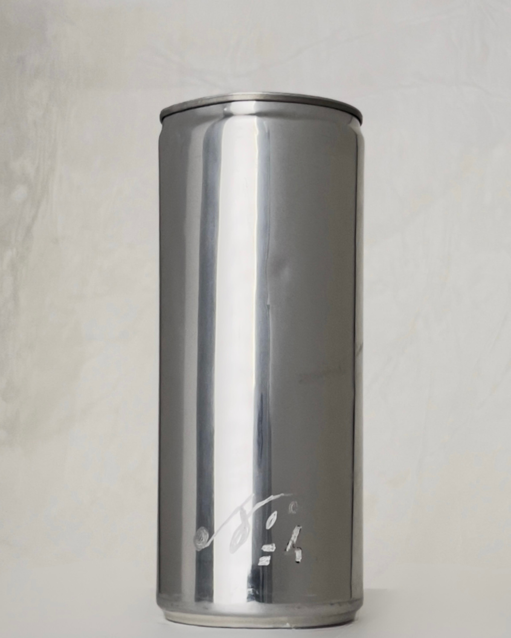 Back of the Sloan Rose N°4 Orchid & Summer Storm candle, engraved with the scent number and illustration