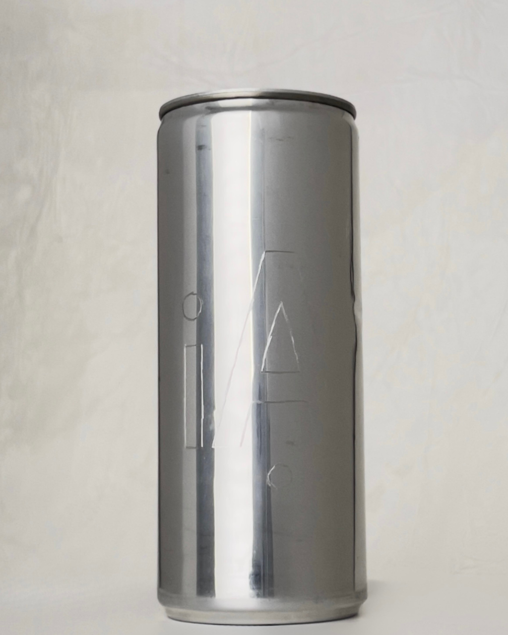 Back of the Sloan Rose N°5 Leather & Labdanum collaboration candle, engraved with the scent number