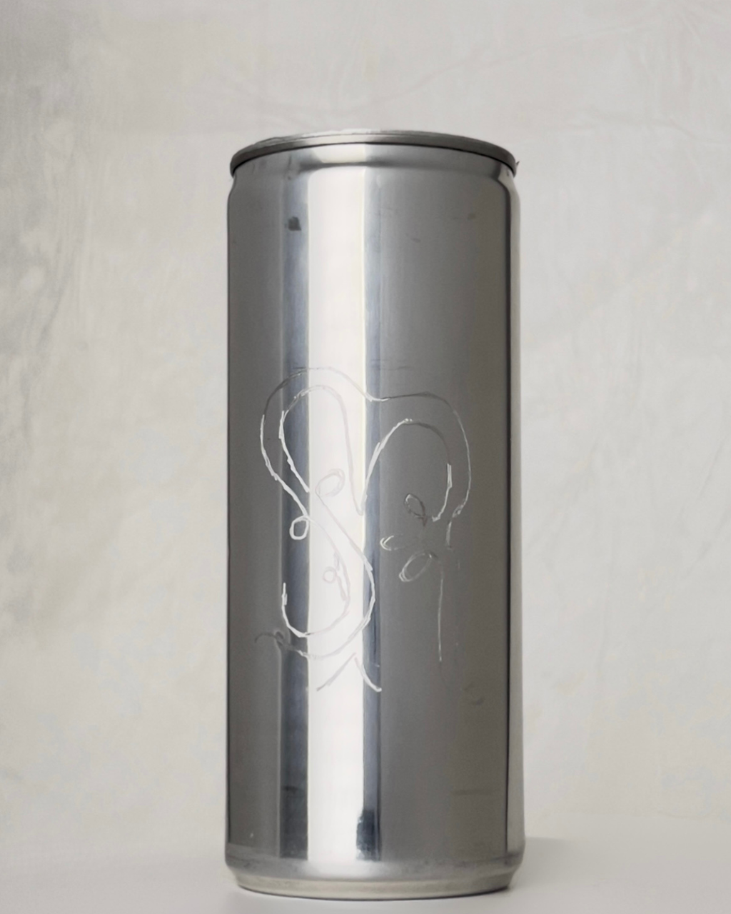 Sloan Rose N°5 Leather & Labdanum candle in a reclaimed aluminum vessel, engraved with the iA monogram